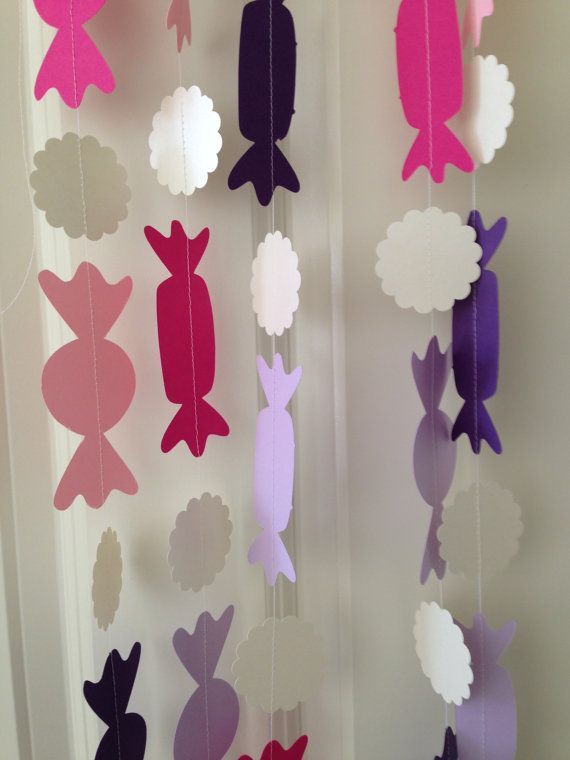 colorful-pastel-and-pink-paper-candy-garland-hanging-vertically