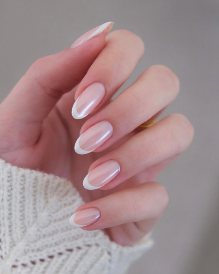 classic-white-french-tip-almond-nails-with-natural-sheer-pink-base