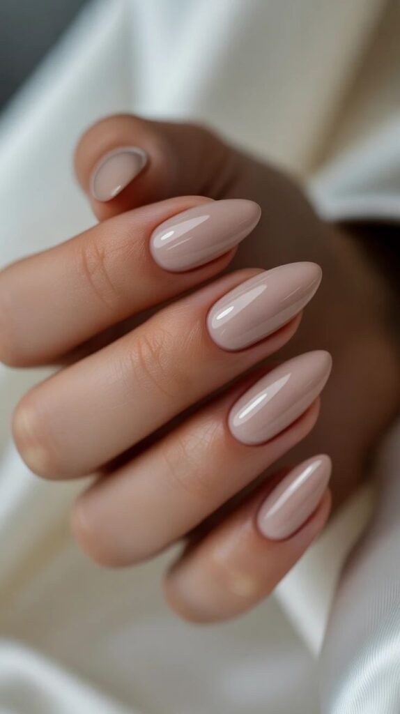 classic-nude-beige-almond-nails-with-high-gloss-finish-for-wedding-nails-for-brides 