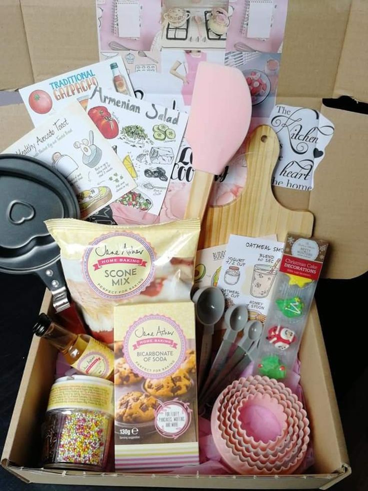 A-baking-gift-box-containing-cookie-mixes,-baking-tools,-measuring-cups,-recipes,-and-baking-themed-decorations-for-Valentines-Day-gift-ideas