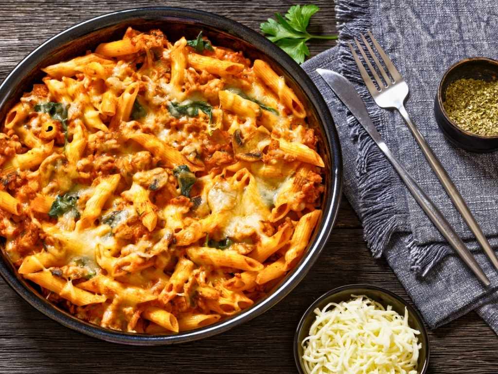 baked-penne-chicken-pasta-casserole-topped-with-melted-cheese