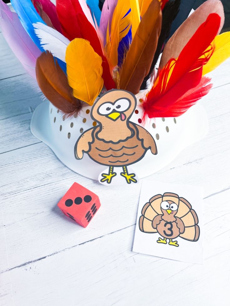 feather-counting-turkey-activity-with-colorful-feathers-dice-and-number-cards-for-thanksgiving-crafts-ideas