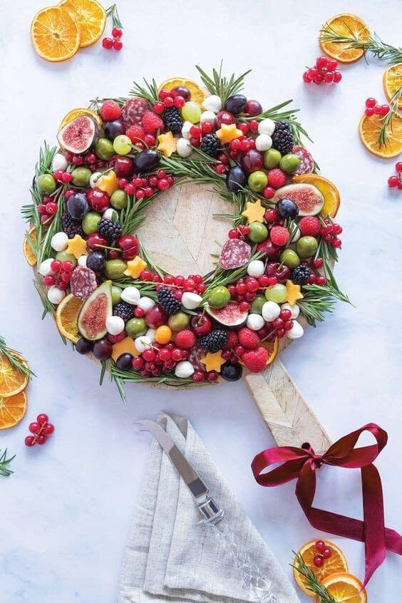 holiday-fruit-and-cheese-wreath-platter-garnished-with-rosemary-and-berries-easy-christmas-party-potluck-ideas