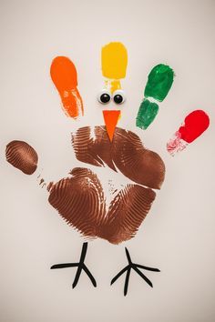 fingerprint-turkey-art-featuring-a-handprint-body-and-painted-fingerprint-feathers
