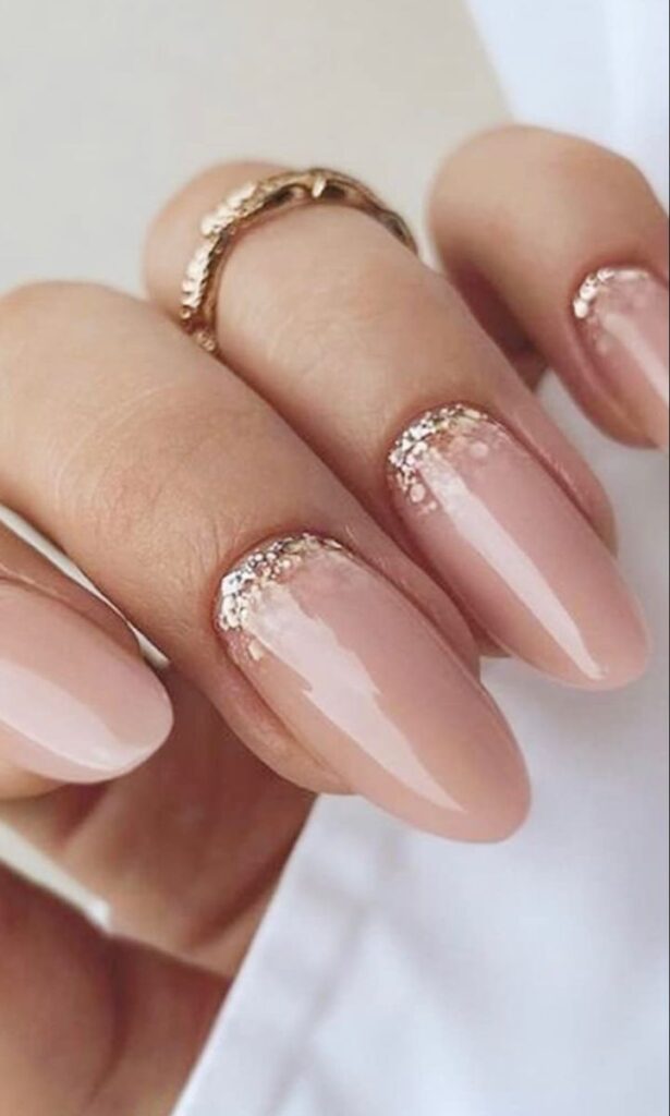 rose-gold-glitter-cuticle-crescent-art-on-glossy-nude-almond-nails-for-wedding-nails-for-brides 