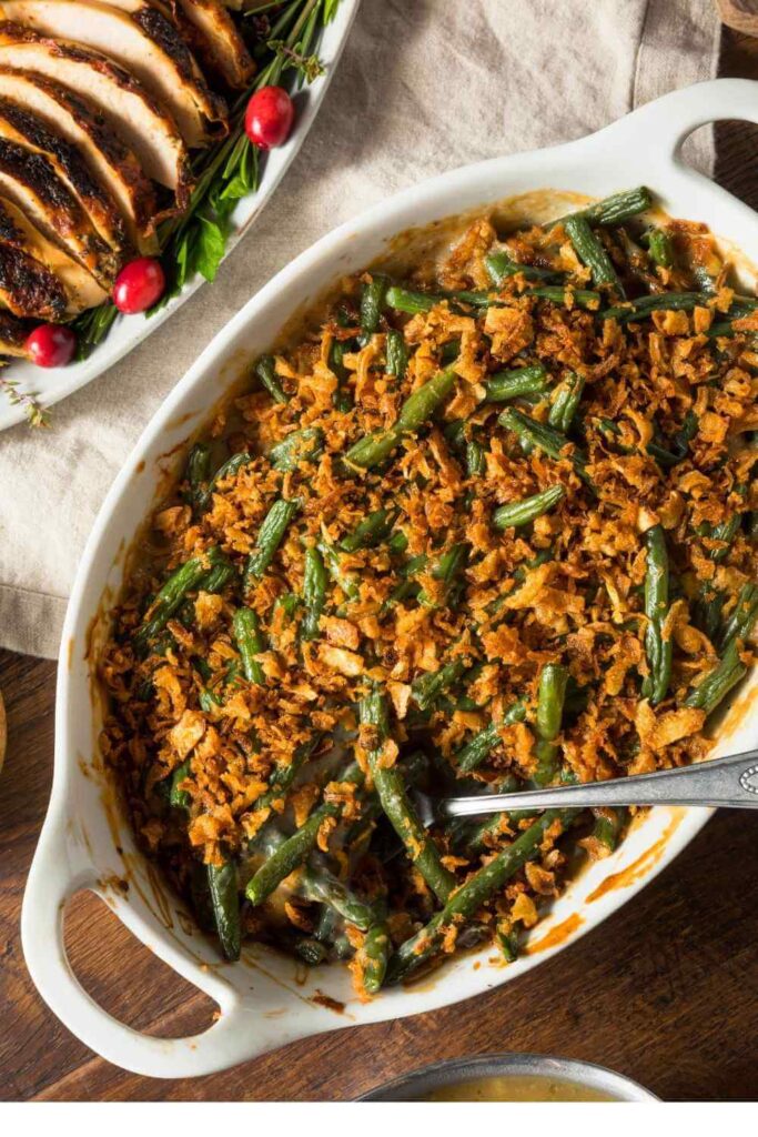 classic-green-bean-casserole-topped-with-crispy-fried-onions-in-a-baking-dish