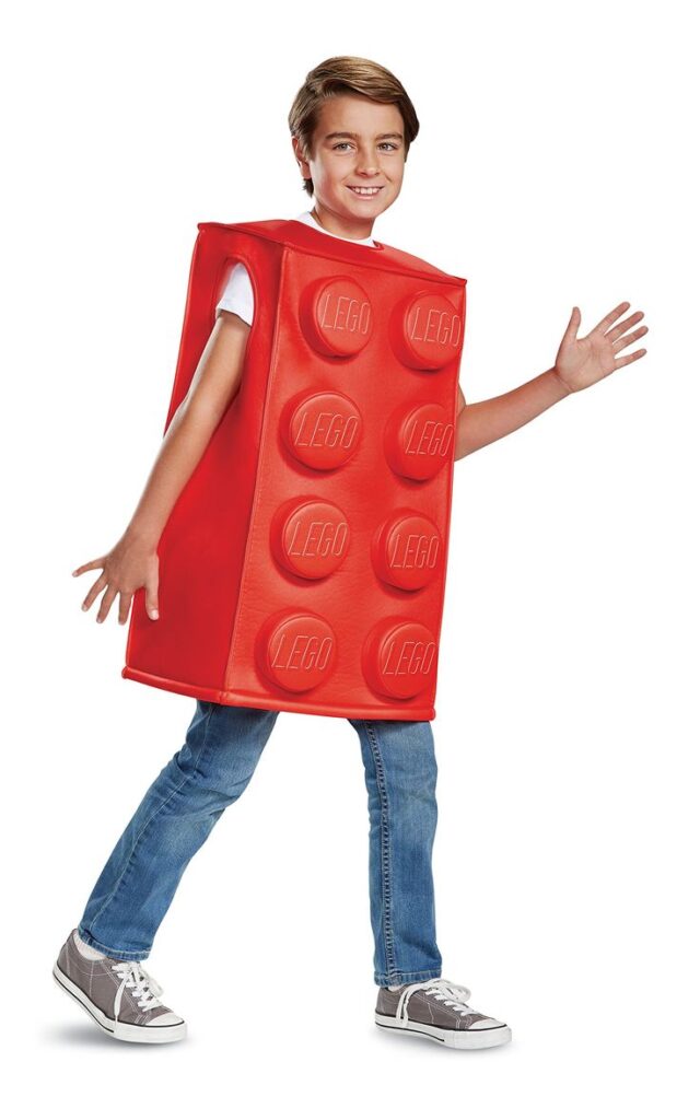 child-wearing-a-red-rectangular-lego-brick-tunic-costume-blue-jeans-and-sneakers
