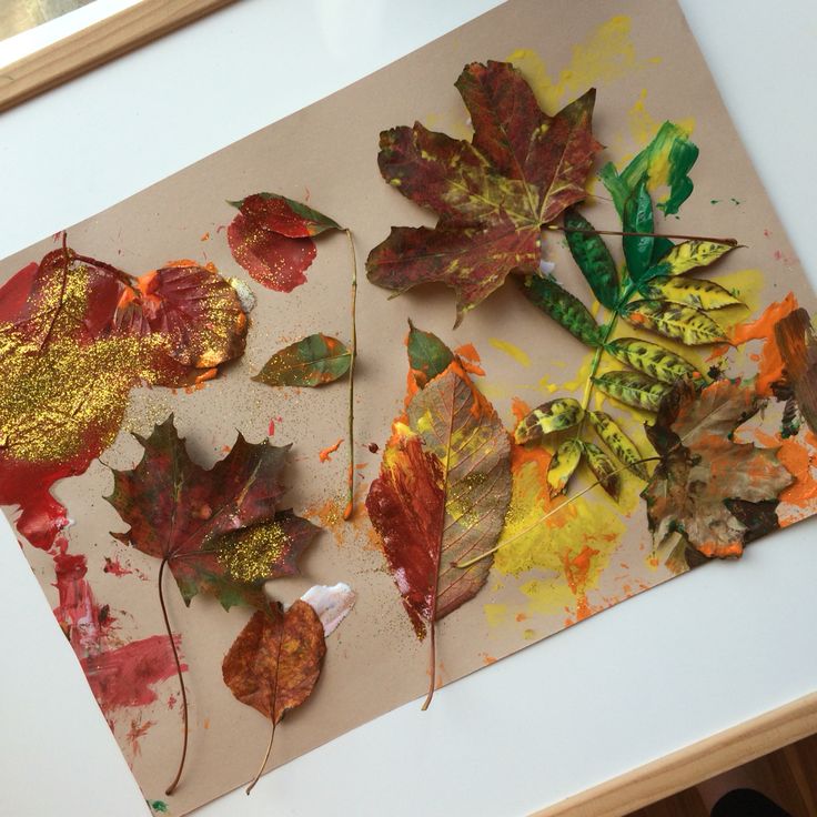 fall-leaf-collage-craft-made-with-autumn-leaves-paint-and-glitter