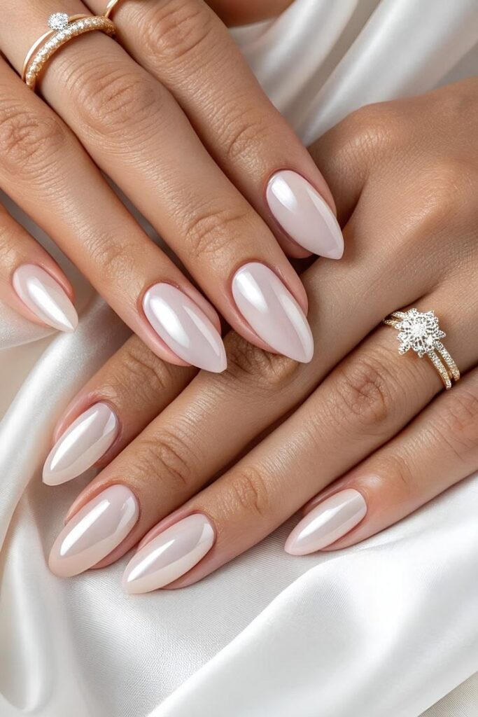 iridescent-pearl-chrome-milky-pink-almond-bridal-nails