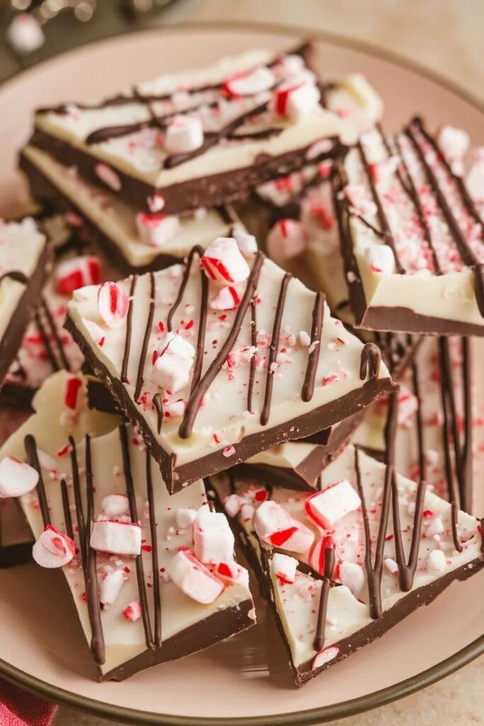 homemade-peppermint-bark-squares-topped-with-crushed-candy-canes-and-chocolate-drizzle