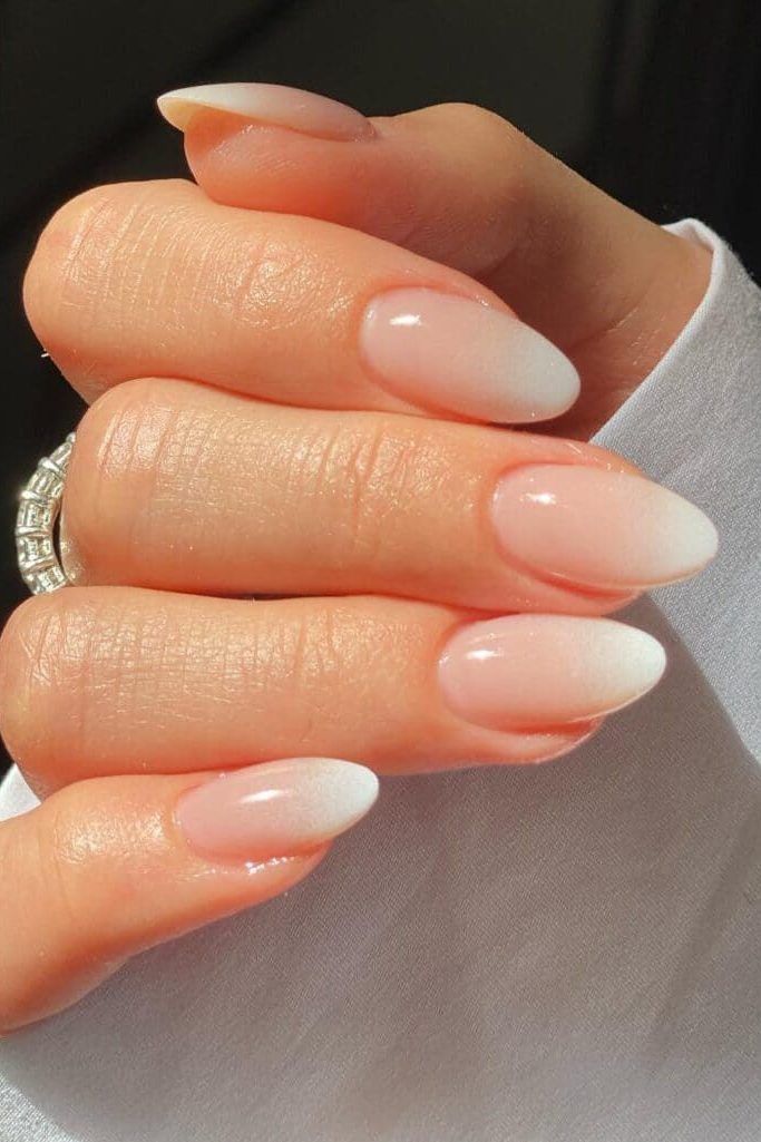 milky-white-tip-french-fade-almond-nails-with-natural-glossy-finish