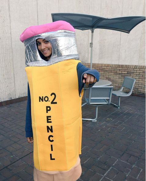 -a-woman-wearing-a-yellow-pencil-pattern-for-Halloween-costume-teachers-ideas