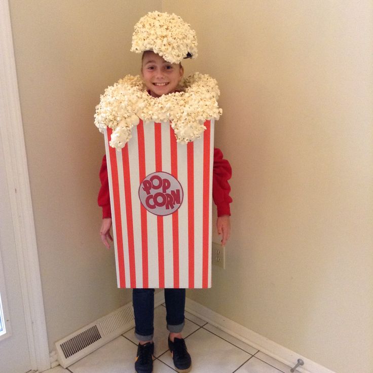child-wearing-a-diy-red-and-white-striped-popcorn-box-costume-with-a-popcorn-covered-headpiece