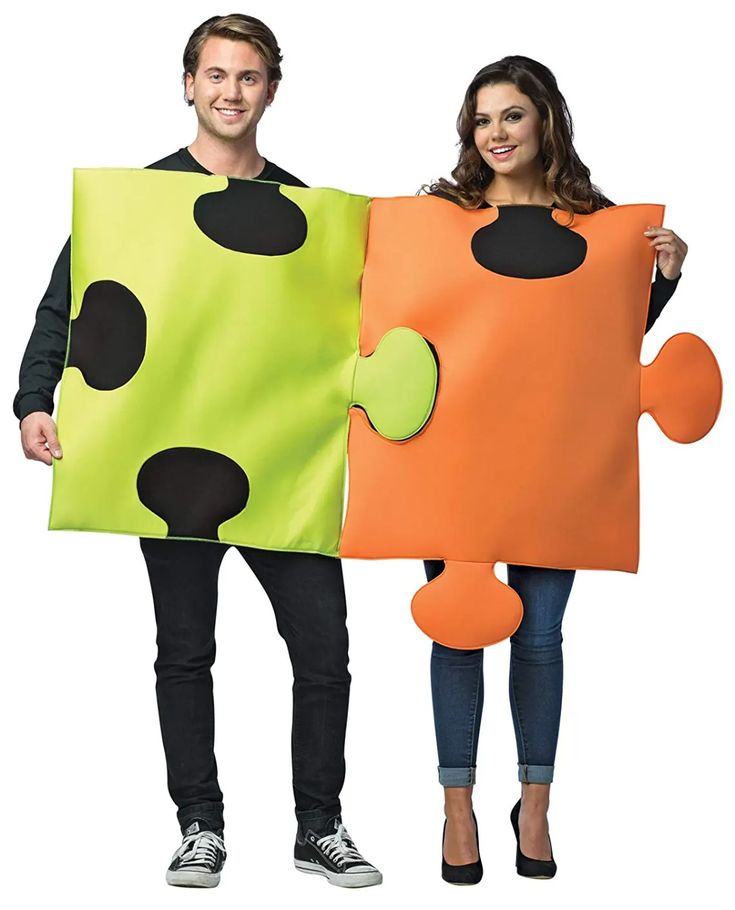 man-and-woman-wearing-matching-lime-green-and-orange-interlocking-puzzle-piece-costumes