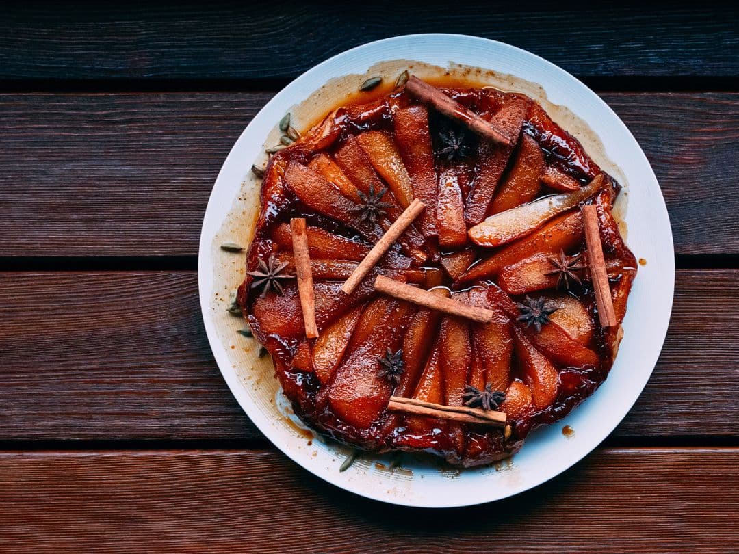 spiced-pear-pie-with-caramel-and-spices-decorated-with-cinnamon-sticks-and-star-anise-for-thanksgiving-desserts-that-aren't-pumpkin-pie