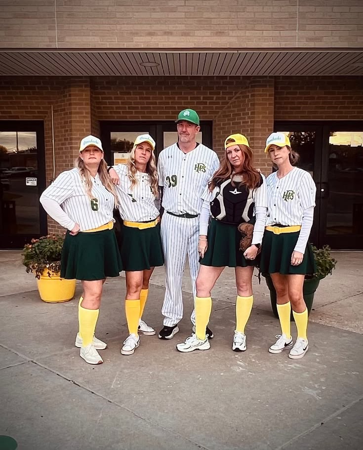 group-dressed-in-matching-green-and-white-retro-baseball-and-softball-team-costumes