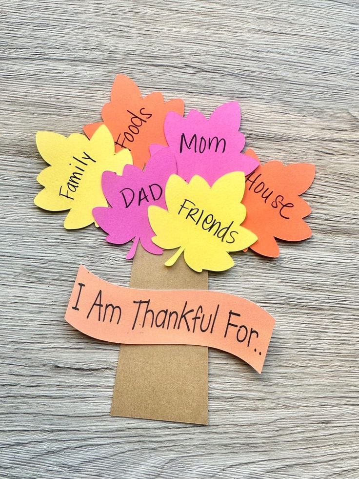 thankful-tree-craft-made-with-colorful-paper-leaves-listing-things-to-be-grateful-for