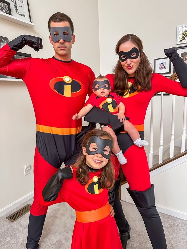 family-of-four-dressed-in-matching-red-the-incredibles-superhero-costumes