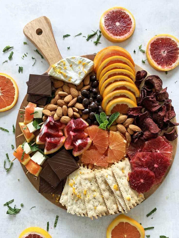 citrus-charcuterie-board-with-blood-orange-slices-almonds-and-dark-chocolate