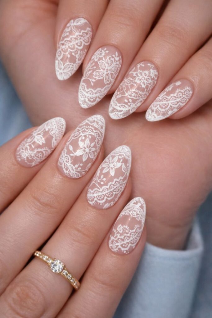 iridescent-pearl-white-almond-nails-with-subtle-crystal-cuticle-accents