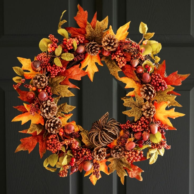 acorn-and-berry-fall-wreath-with-autumn-leaves-pinecones-and-woven-pumpkin-on-black-door
