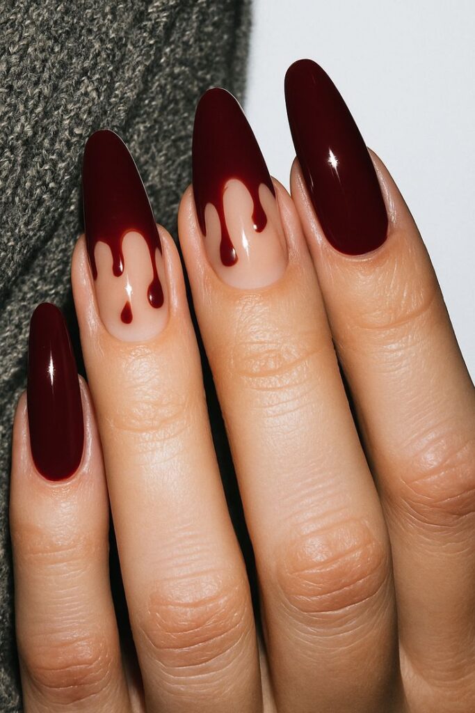 dramatic-blood-drip-halloween-nail-art-with-deep-red-and-nude-base
