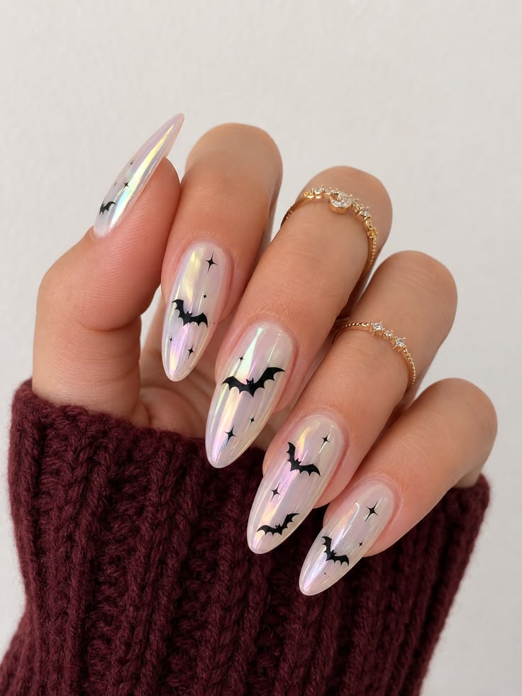 cute-little-black-bat-nail-art-on-iridescent-nude-chrome-base