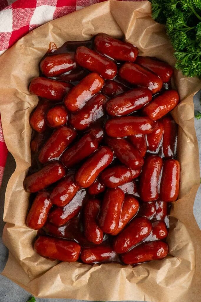 little-smokies-in-bbq-blood-sauce-on-parchment-paper-Halloween-crockpot-recipes