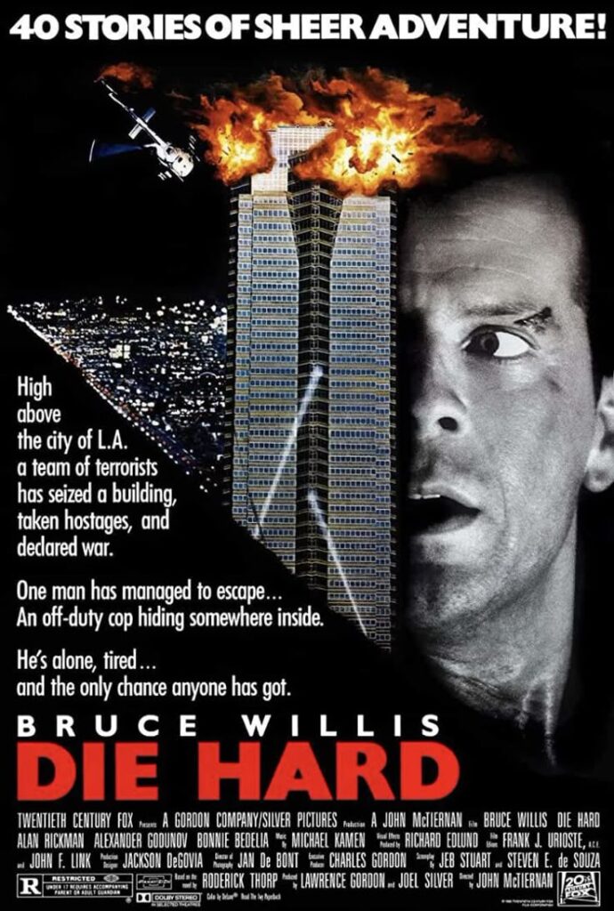 movie-poster-for-die-hard-starring-bruce-willis-showing-his-face-alongside-an-exploding-skyscraper-at-night-hard-classic-Christmas-movies