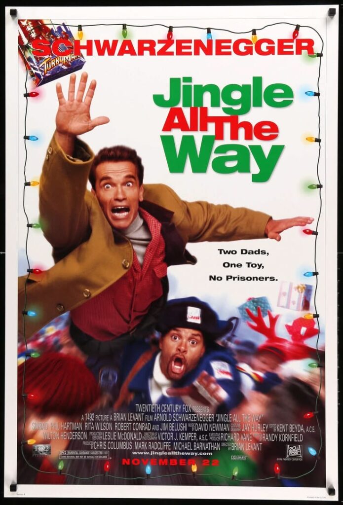 movie-poster-for-jingle-all-the-way-starring-arnold-schwarzenegger-reaching-out-frantically-framed-by-colorful-christmas-lights-with-sinbad-below-hard-classic-Christmas-movies