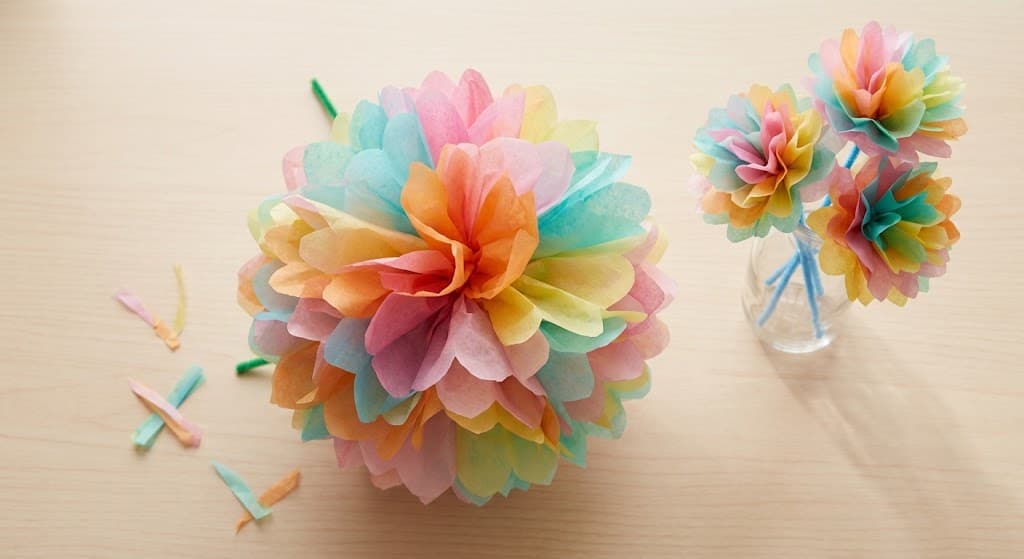 vibrant-multicolored-tissue-paper-bloom-and-small-paper-flower-bouquet-in-a-glass-vase