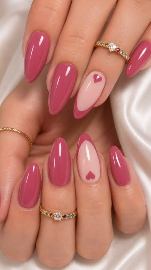 pink-almond-nails-with-french-frame-and-heart-accent